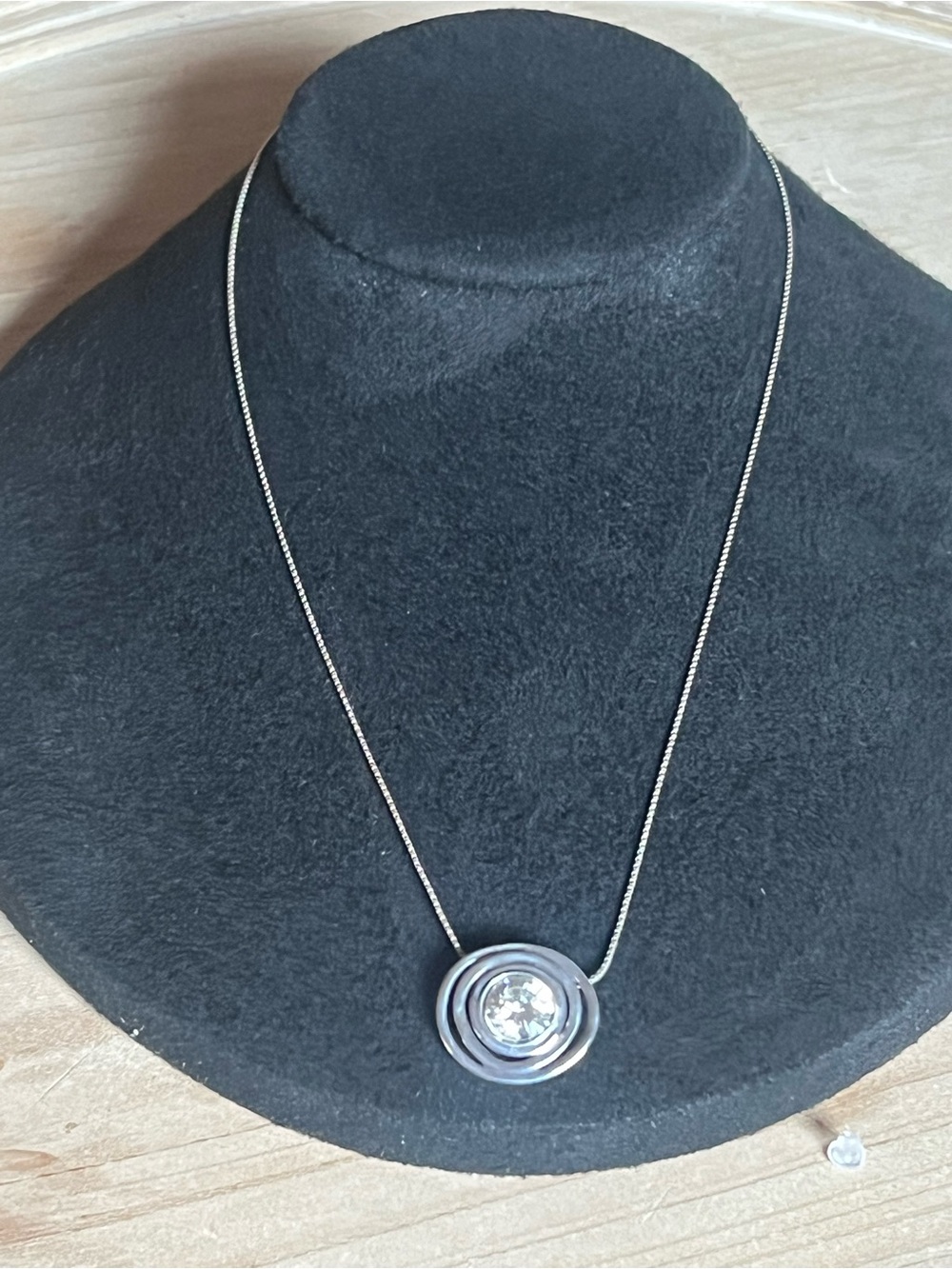 Silver-Tone Circular Pendant Necklace with Clear Crystal Accent